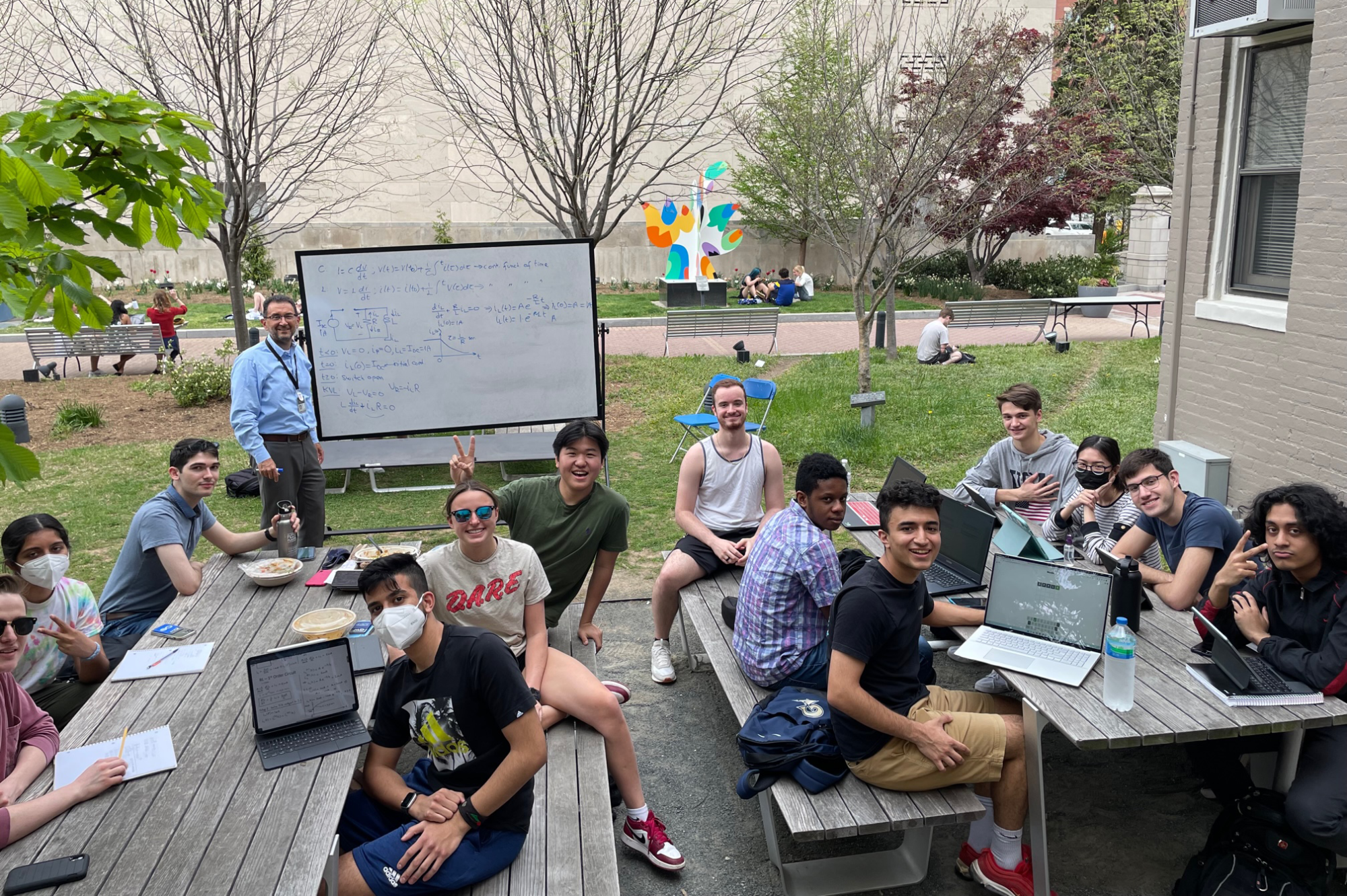 students attending class outside
