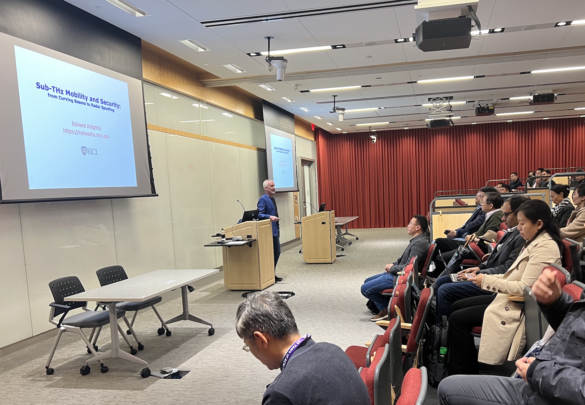 Attendees listening to Edward Knightley's presentation