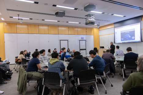 Participants listening to a presentation