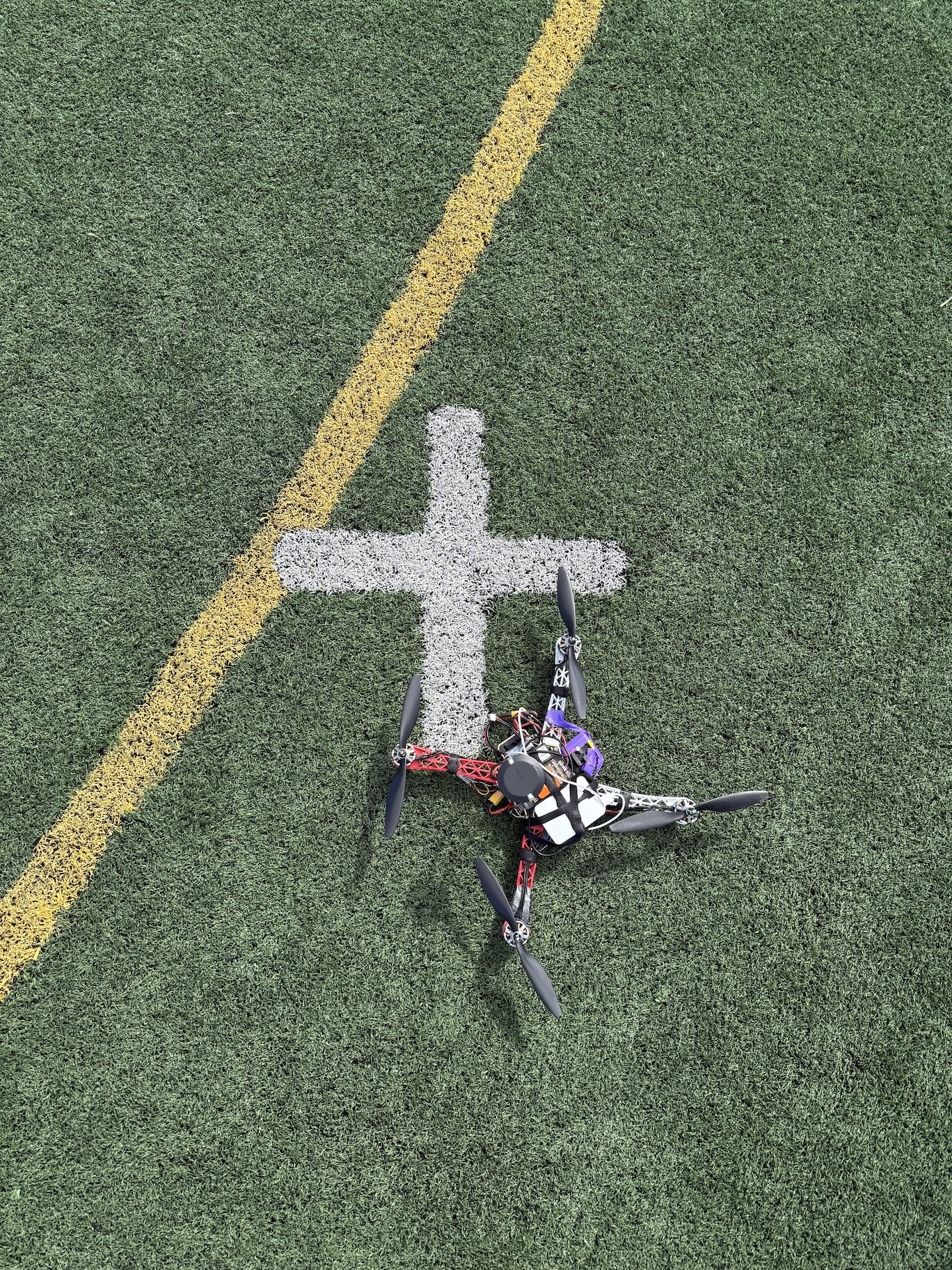 The team’s scout drone, pictured on a soccer field. 