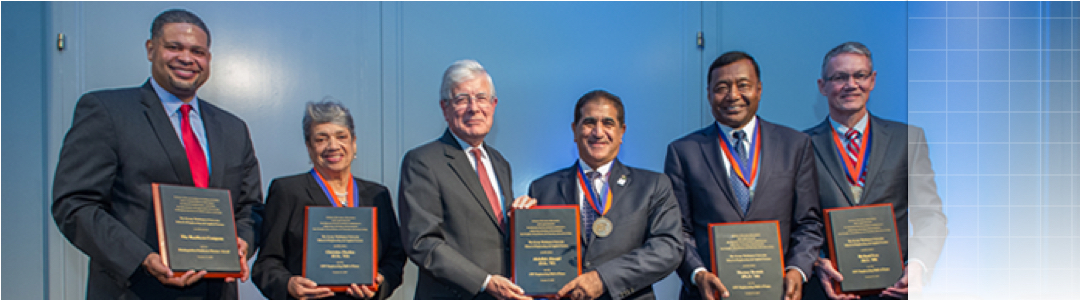 hall of fame members at award ceremony