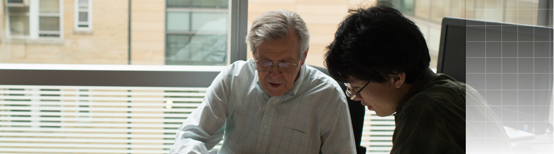 student working with professor