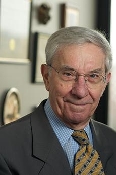 Professor Helgert in a grey suite