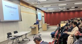 Attendees listening to Edward Knightley's presentation